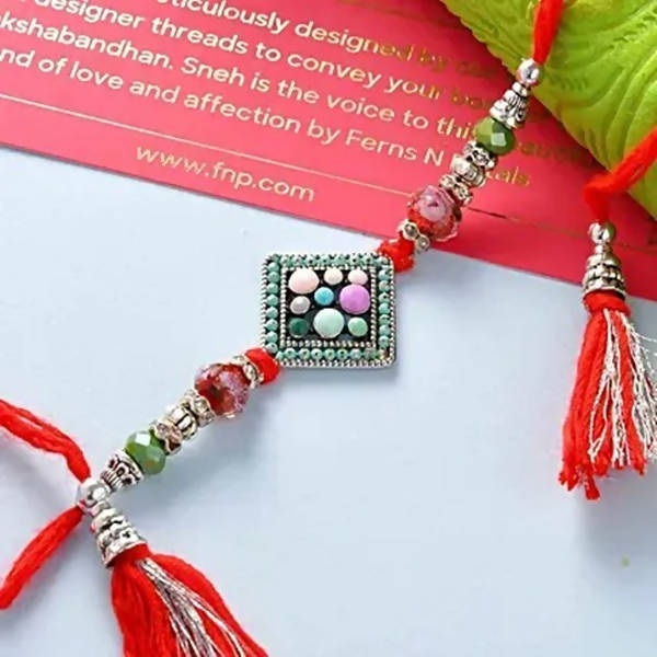 Designer Beads Rakhi N Assorted Chikki Combo