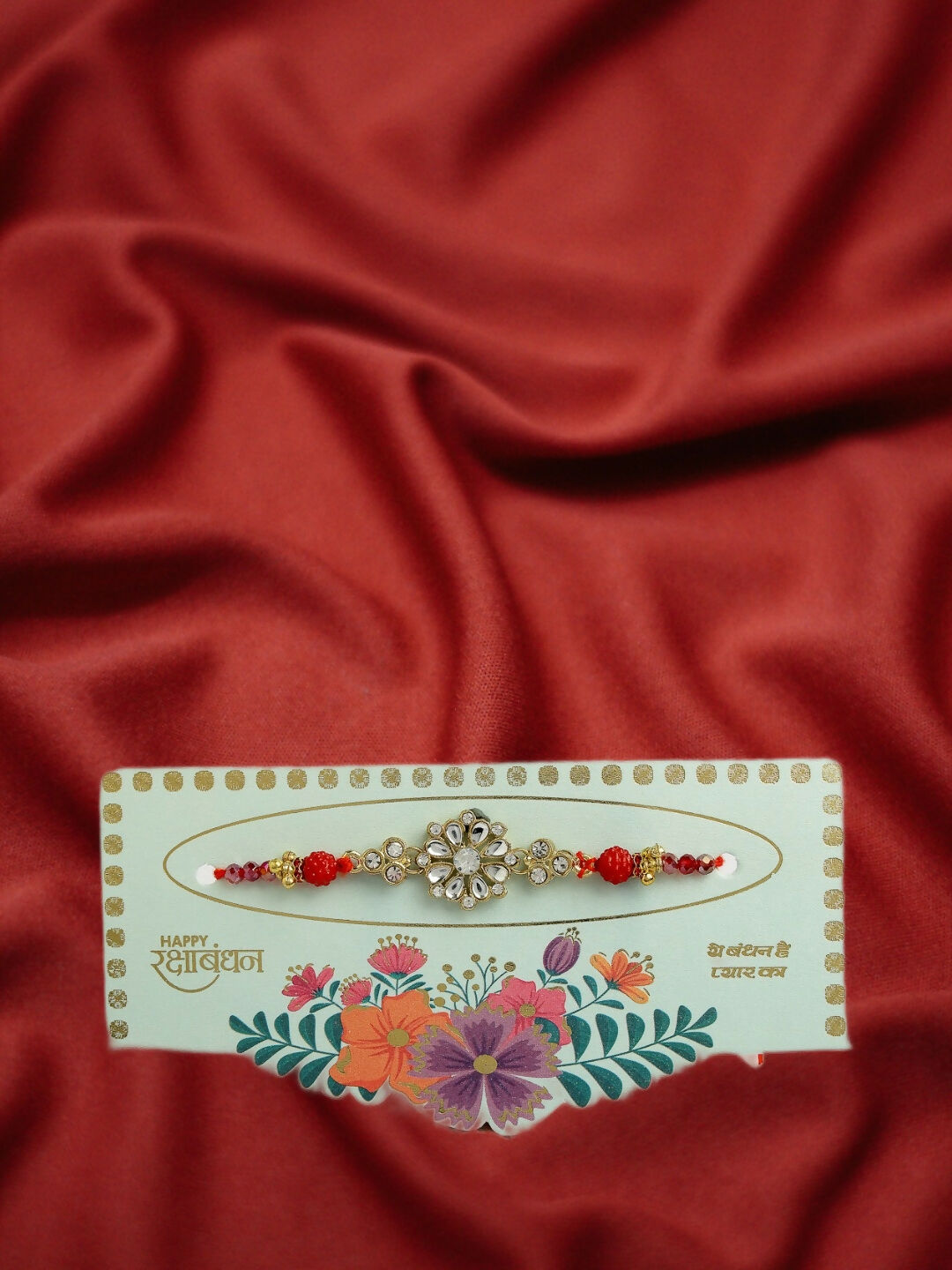NVR Men Gold-Toned Stone-Studded Rakhi With Roli Chawal