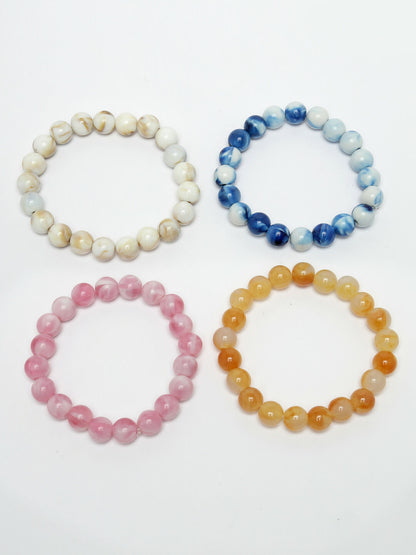 NVR Women & Men Set of 4 Multicolor Elasticated Rakhi With Roli Chawal