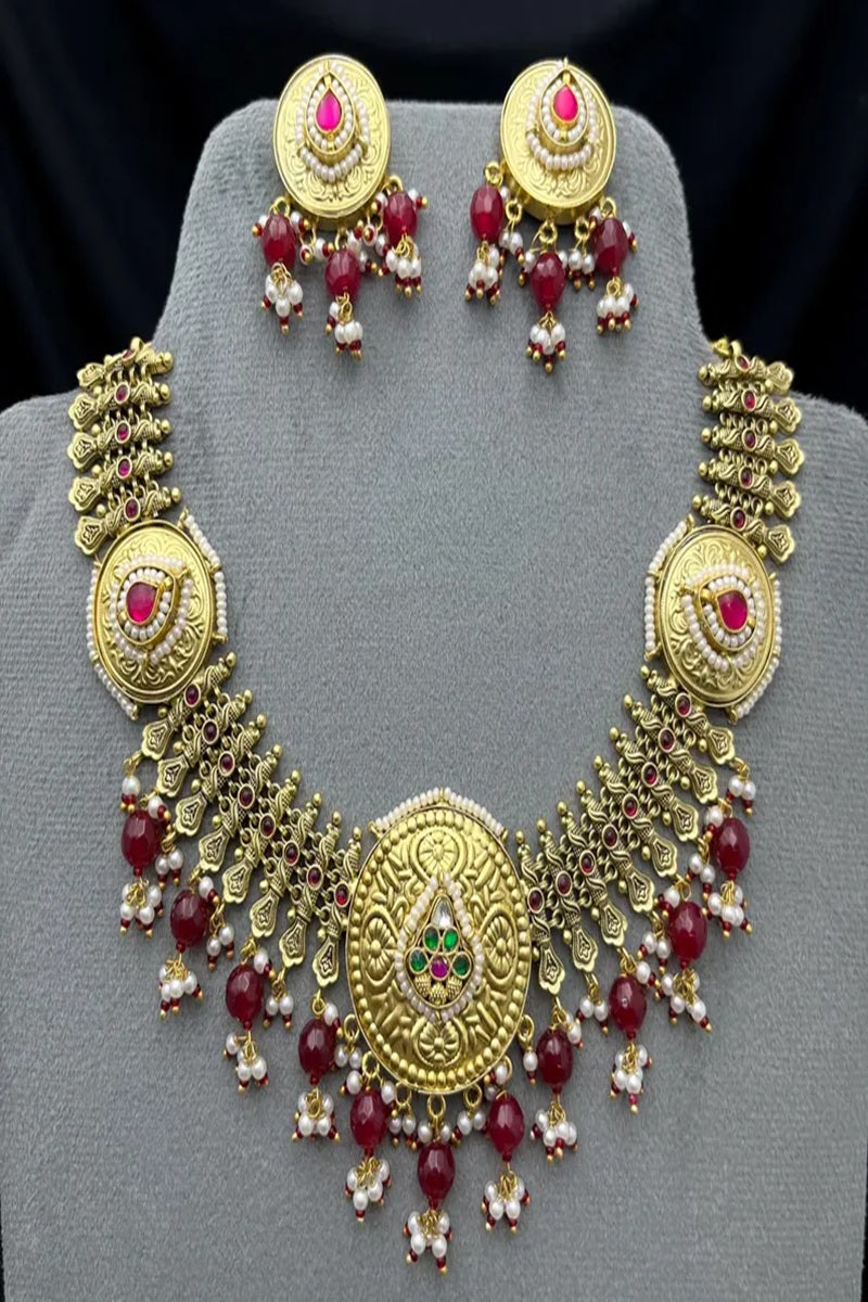 Vastrabhushan Antique Gold Kundan Necklace Set | Indian Bridal Jewelry with Pearls & Red Stones