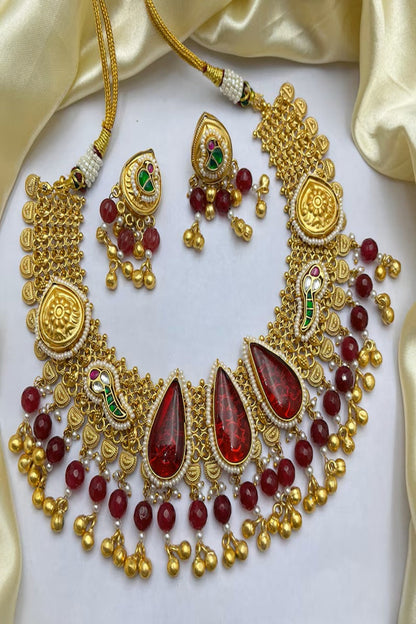 Vastrabhushan Antique Gold Kundan Choker Necklace Set with Ruby Red Stones