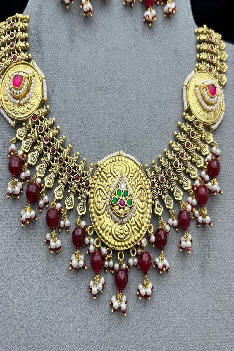 Vastrabhushan Antique Gold Kundan Necklace Set | Indian Bridal Jewelry with Pearls & Red Stones