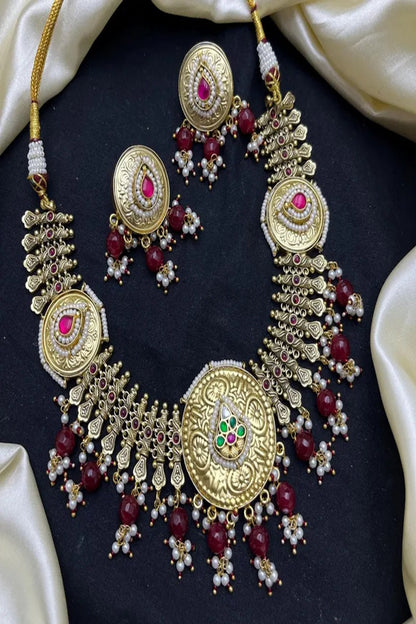 Vastrabhushan Antique Gold Kundan Necklace Set | Indian Bridal Jewelry with Pearls & Red Stones