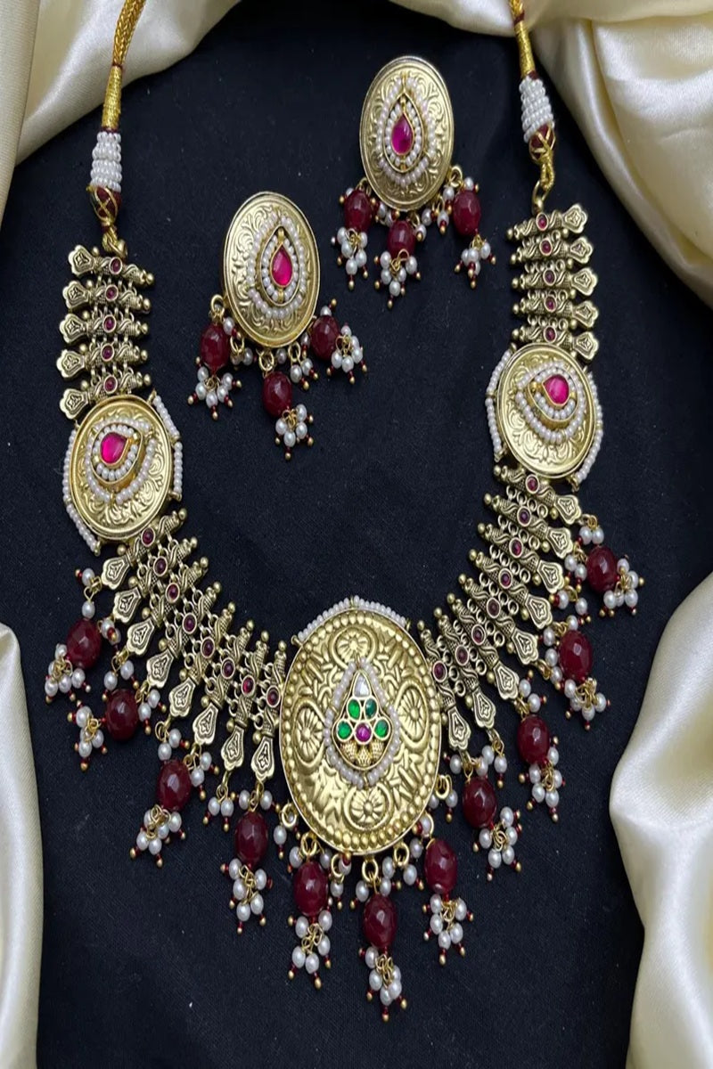Vastrabhushan Antique Gold Kundan Necklace Set | Indian Bridal Jewelry with Pearls & Red Stones