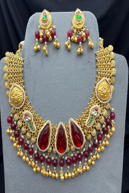 Vastrabhushan Antique Gold Kundan Choker Necklace Set with Ruby Red Stones