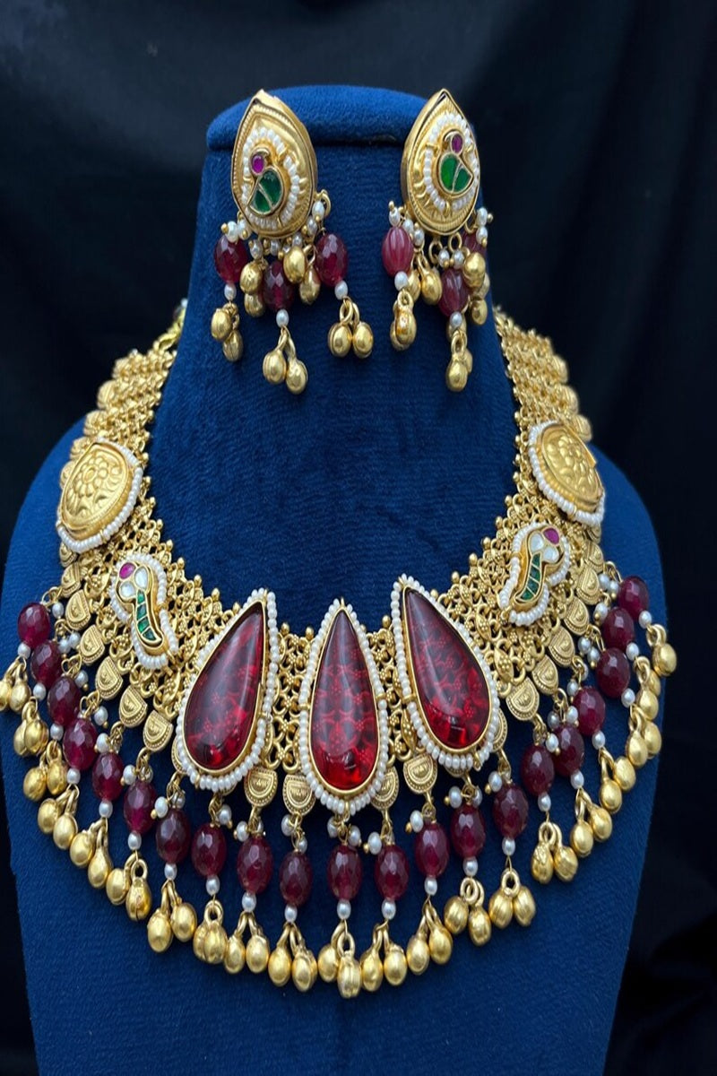 Vastrabhushan Antique Gold Kundan Choker Necklace Set with Ruby Red Stones