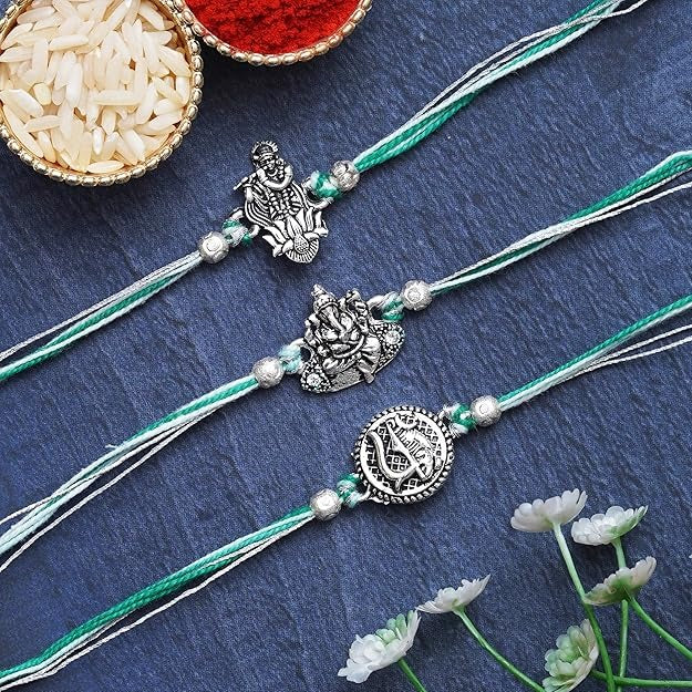 eCraftIndia Set of 4 Lord Ganesha, Krishna Flute with Peacock Feather, Lord Krishna Playing Flute
