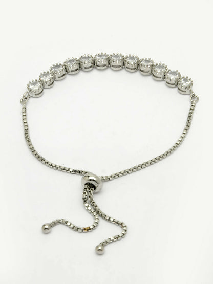 NVR Women Silver-Plated American Diamond Studded Rakhi With Roli Chawal