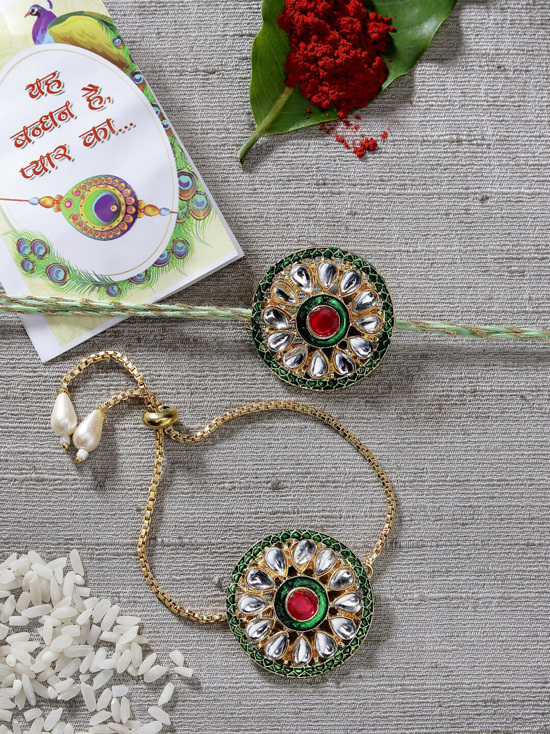 NVR Women & Men Set of 2 Gold Kundan-Studded Handcrafted Wraparound Rakhi Set With Roli Chawal