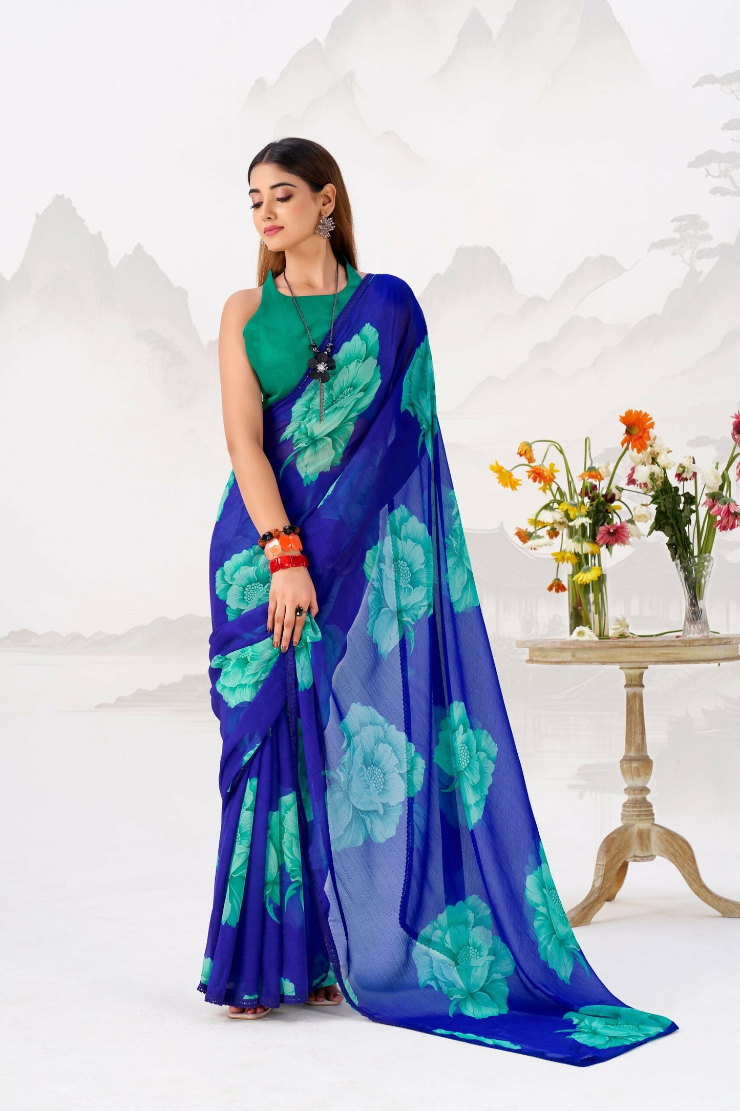 Vastranavya Royal Blue Floral Print with Lace Border work Chiffon Saree & Unstitched Blouse