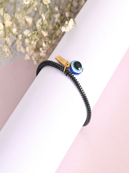 NVR Women & Men Black Evil Eye Spring Ring Rakhi With Roli Chawal