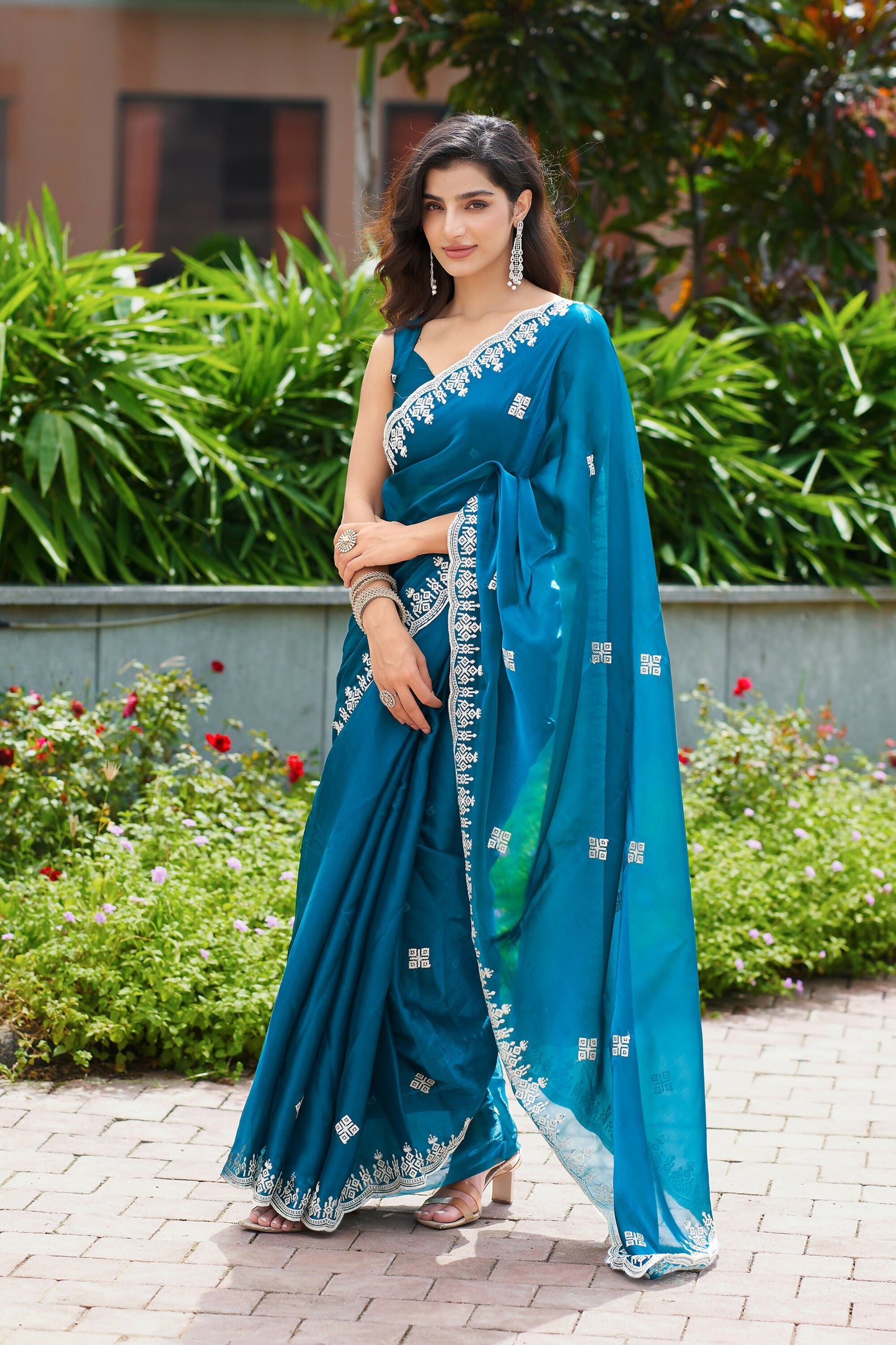 Vastranavya Teal Embroidery Work Shimmer Chiffon Saree with Unstitched Blouse