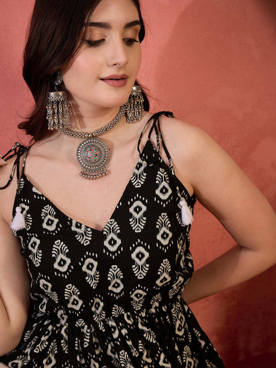 Sangria Printed V-Neck Sleeveless Peplum Top