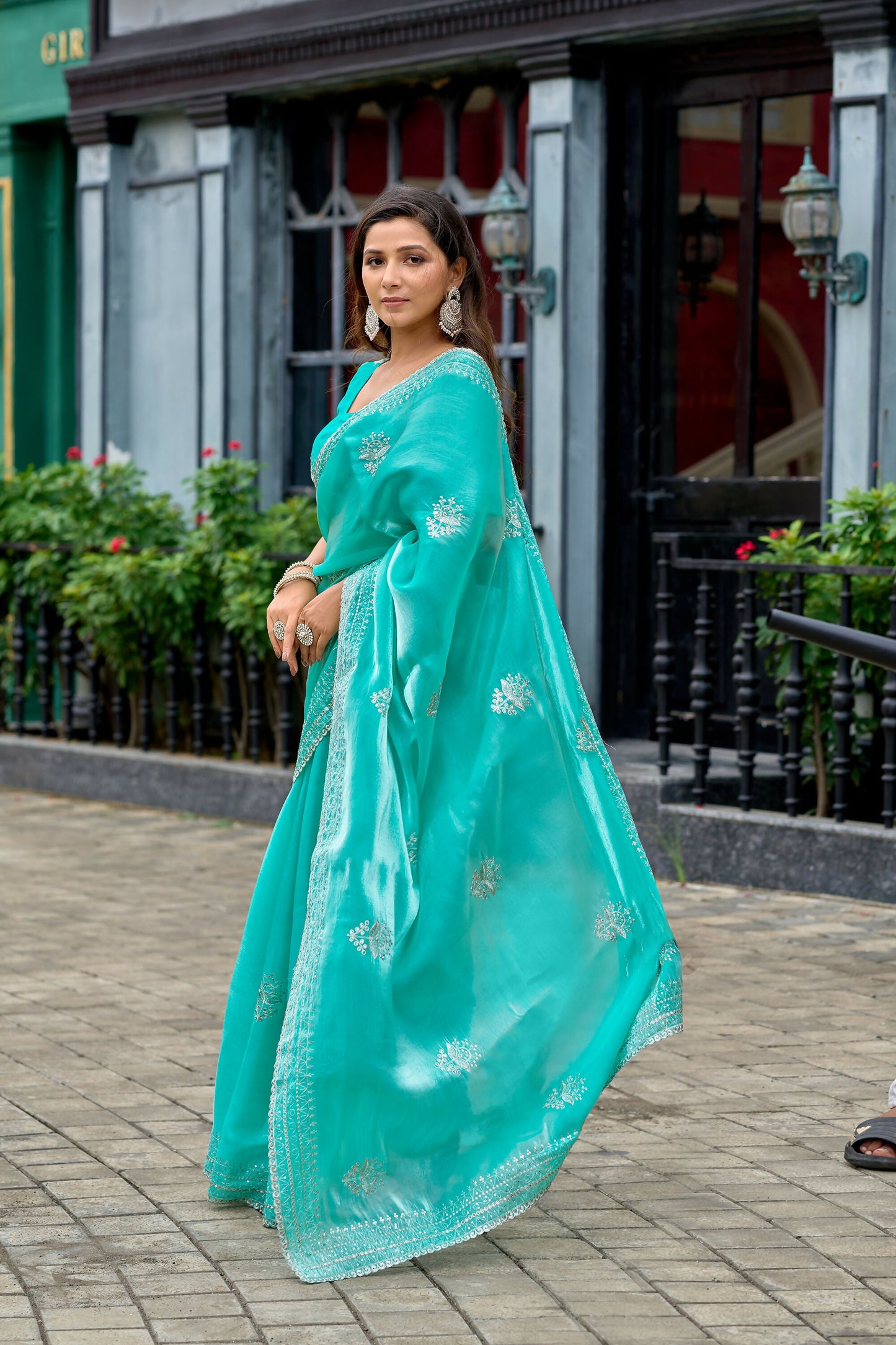 Vastranavya Turquoise Embroidery Work Shimmer Chiffon Saree with Unstitched Blouse