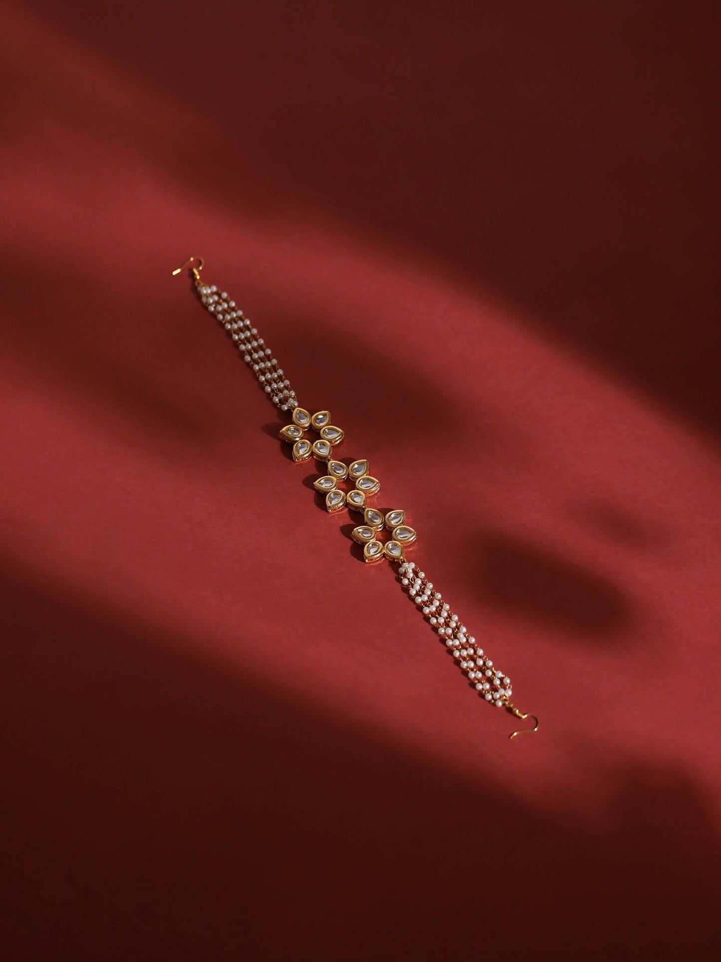 Gold-Polished White Kundan-Studded Pearl Beaded Hair Band - Ruby Raang