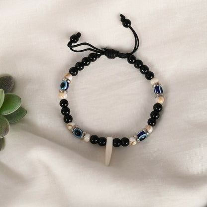 NVR Women & Men Black Evil Eye Rakhi With Roli Chawal