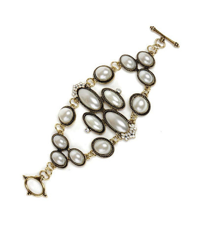 Gold-Polished Alloy Pearl Studded Designer Bracelet - The Pari