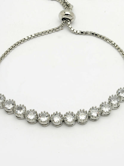 NVR Women Silver-Plated American Diamond Studded Rakhi With Roli Chawal