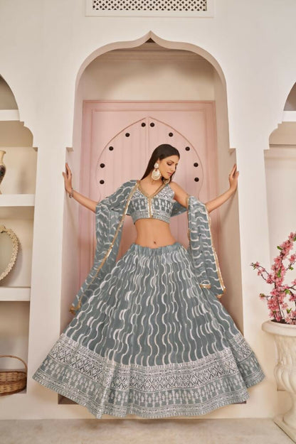 Aastha Fashion Gray Butterfly Net White Cotton Thread Work, Zari Work And Sandwich Sequence Work Embroidery Wedding Wear Lehenga Choli