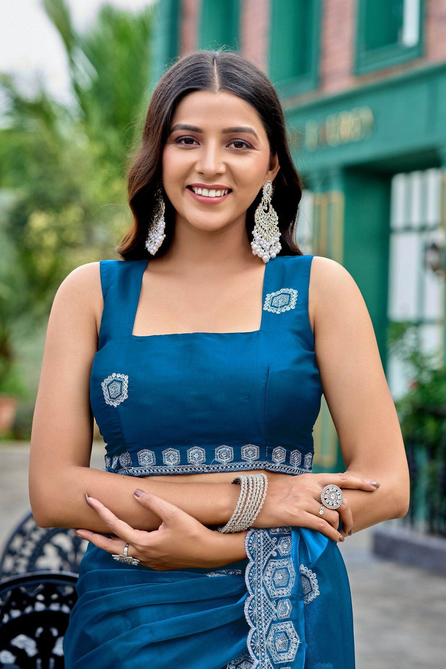 Vastranavya Teal Embroidery Work Shimmer Chiffon Saree with Unstitched Blouse